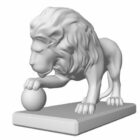 Estátua de leão com bola