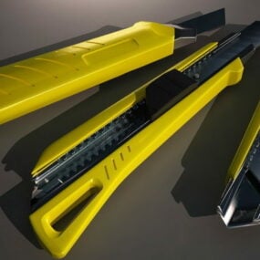 أداة مكتبية سكين أصفر اللون نموذج ثلاثي الأبعاد