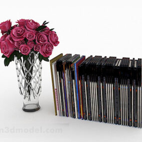 Wazon z czerwonymi kwiatami i książkami Model 3D