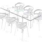 ガラスのテーブルとプラスチックの白い椅子