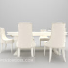 Valkoinen tyylikäs ruokapöytä tuoleilla