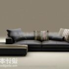Черный кожаный диван с подушкой