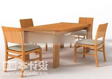 Mesa de comedor de madera y cuatro sillas