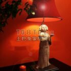 Lampe de table avec base de figurine