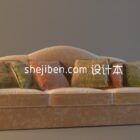 Aksamitna sofa w kolorze wielbłąda z poduszką