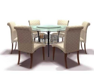 Round Glass Dining Table With Upholstered Chair