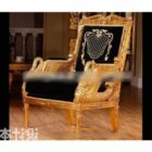Luxuriöser goldener Sessel