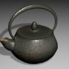 Old Cast Iron Teapot