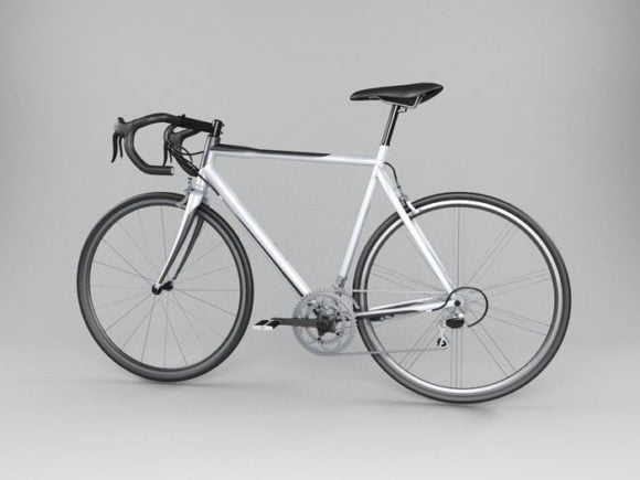 Велосипед для шоссейных гонок, окрашенный в белый цвет