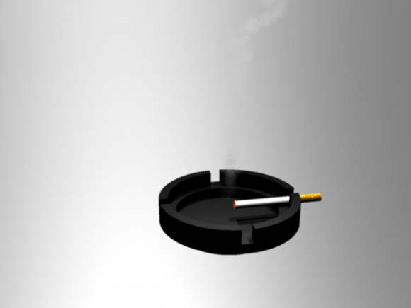 Cenicero de cigarrillos encendido
