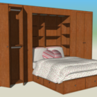 Dormitorio con cama de gabinete