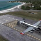 Avion militaire atterrissant sur une base aérienne