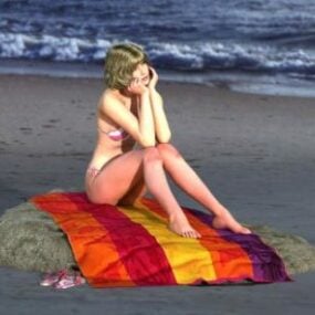 مدل سه بعدی بیکینی دختر جوان روی پتو در ساحل