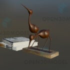 آثار هنری مجسمه پرنده ساده با پشته کتاب