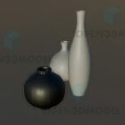 Weiße Vase, schwarze Schüssel, Tischdekoration